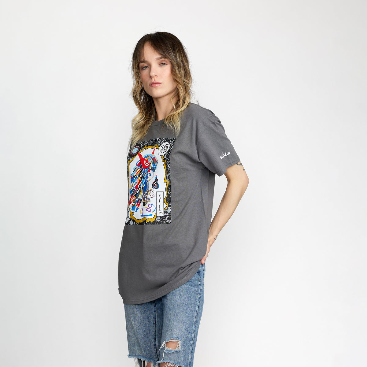 Woman wearing Kikuo Oriental Tee in Grey; Front and sleeve printing, official merch by TSURT