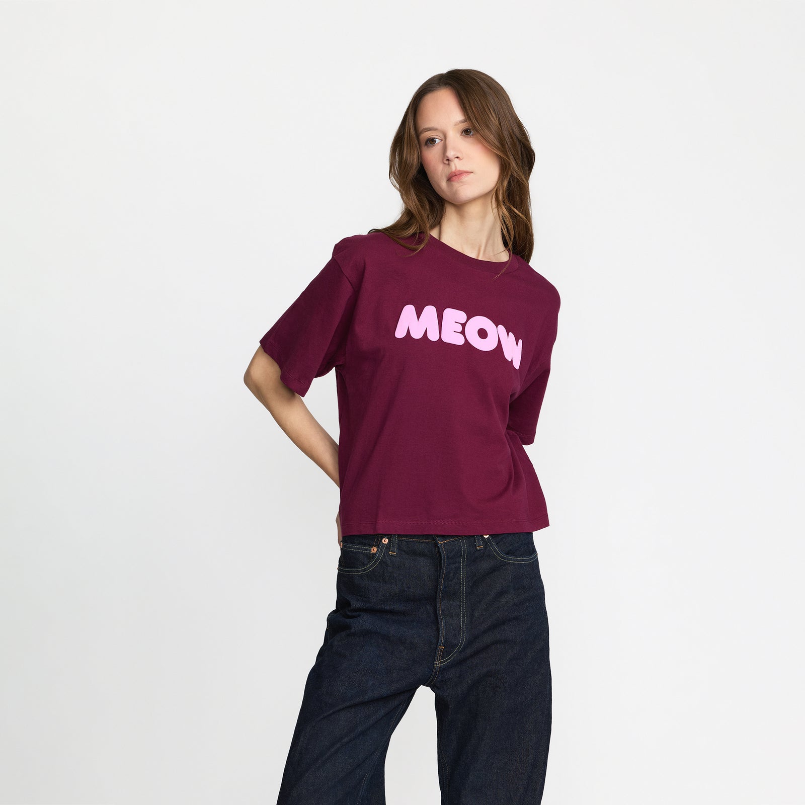 Burgundy crop t-shirt with 'MEOW' printed; official Ted & Herb merch by TSURT