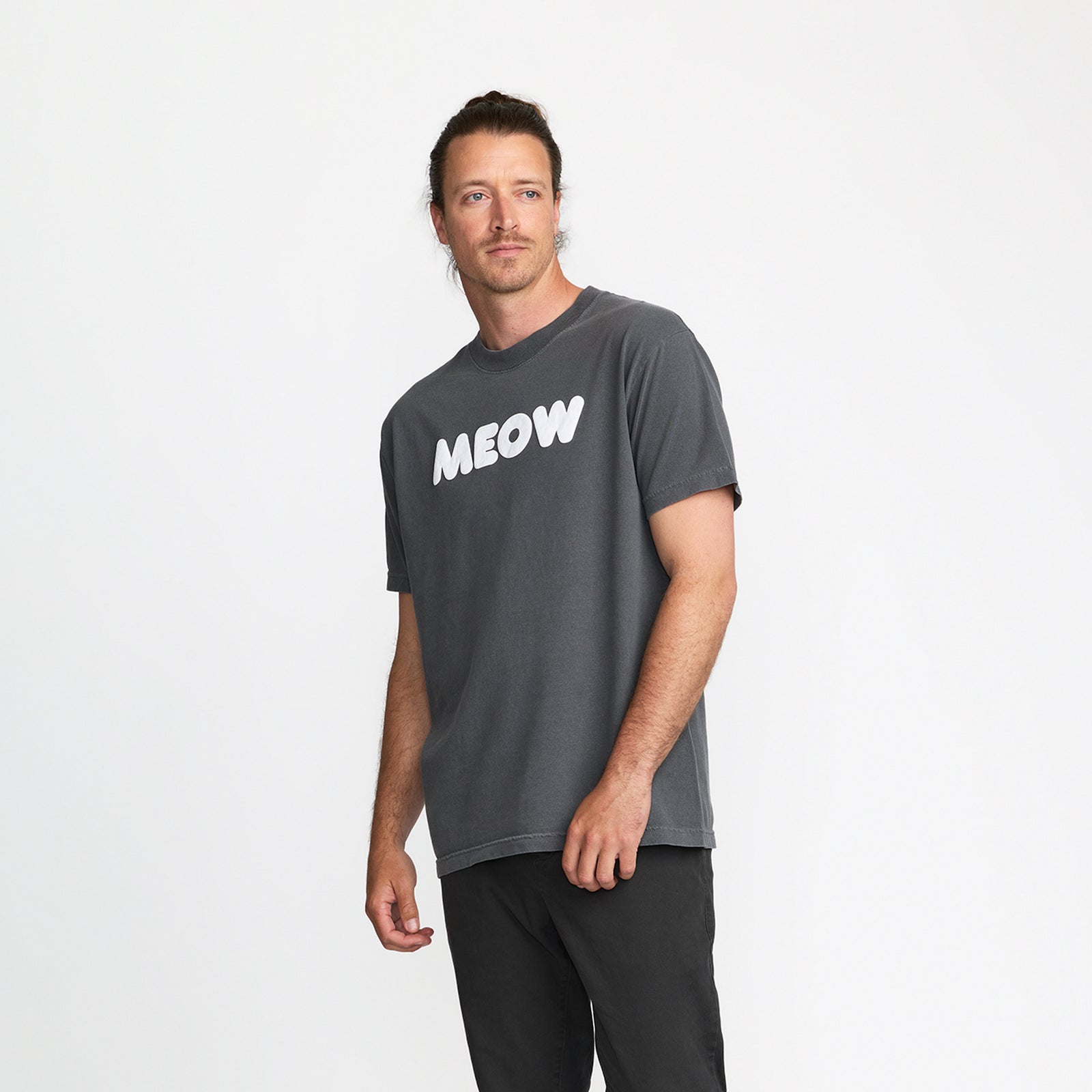 Black t-shirt with 'MEOW' printed; official Ted & Herb merch by TSURT