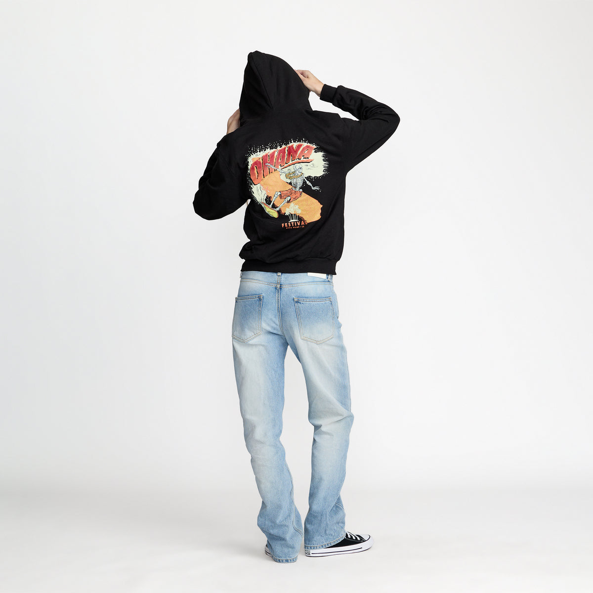 Ohana Festival Surfer Skelly Zip back print on model; official Ohana Festival merch by TSURT