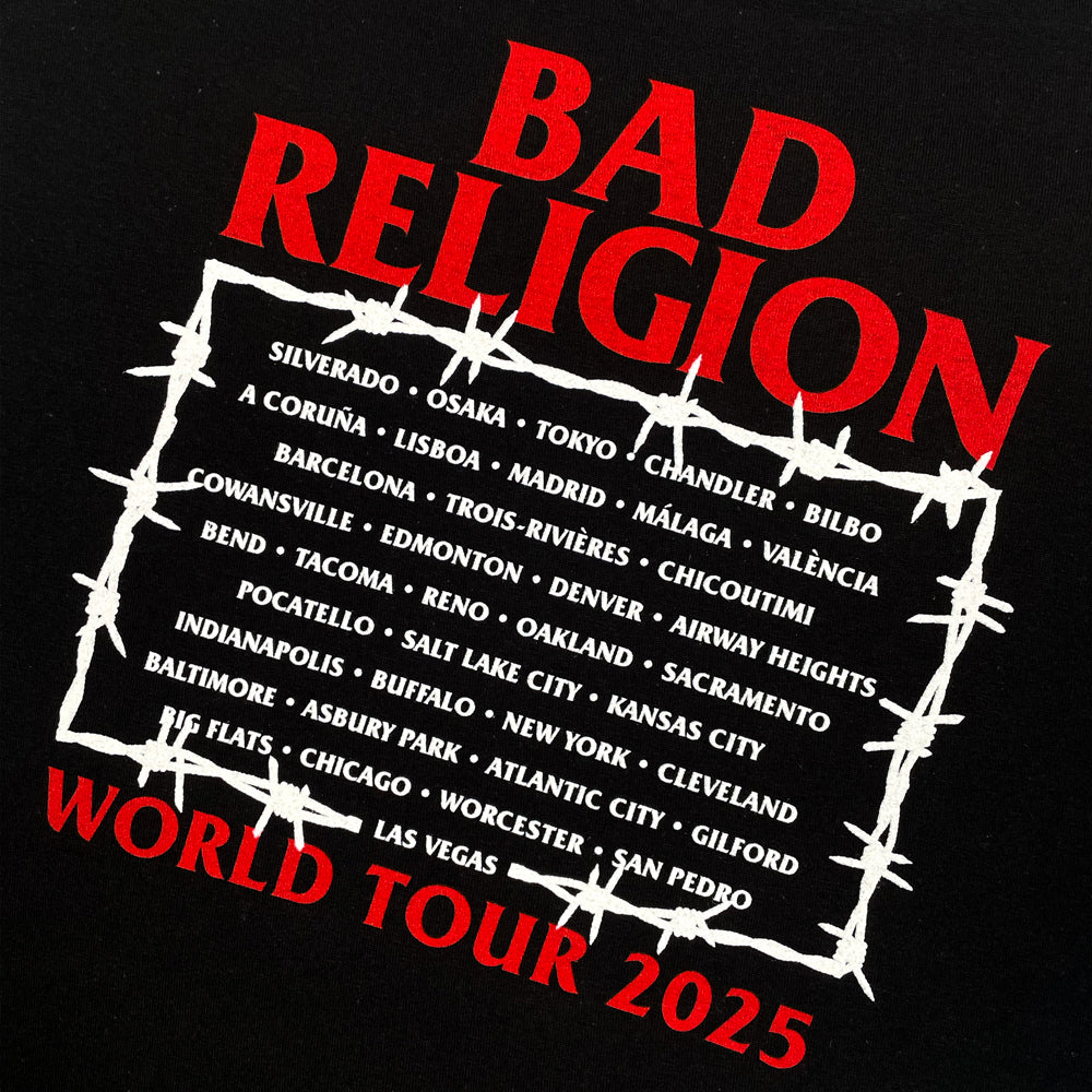 Close up of a black t-shirt with red text reading "BAD RELIGION WORLD TOUR 2025" and white text listing city names from the 2025 tour
