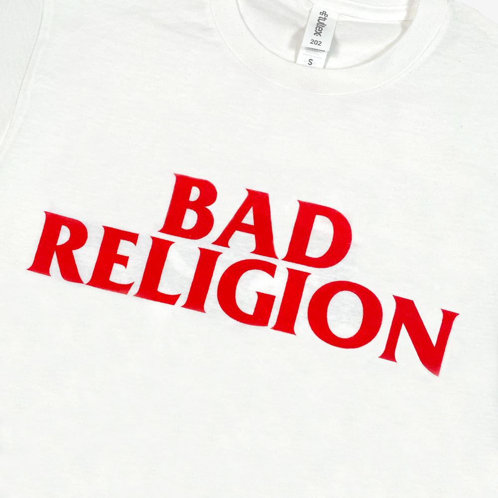 Close up of a white Bad Religion tee front print with red lettering reading "Bad Religion"