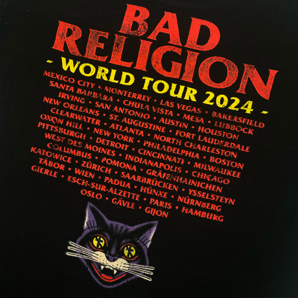 Close up of the back print of black Bad Religion tee with lettering reading "Bad Religion World Tour 2024" followed by list of cities from the 2024 tour.