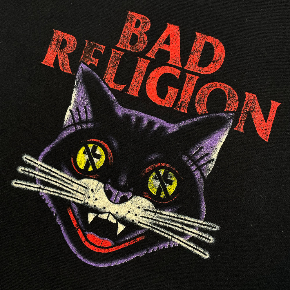 Front print of black Bad Religion t-shirt with cat graphic below lettering which reads "Bad Religion"