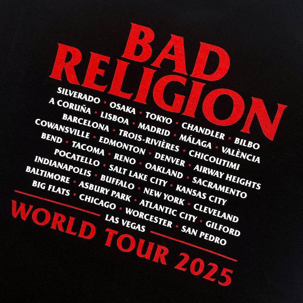 Close up of a black t-shirt with red and white text reading "Bad Religion World Tour 2025" and the list of cities from the band's 2025 tour