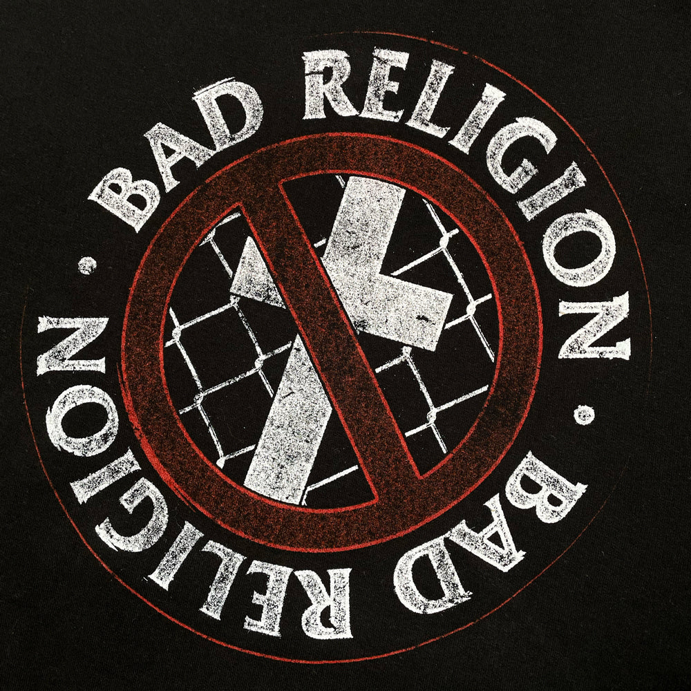 Close up of a back print of black Bad Religion hoodie with circular crossbuster graphic surrounded by the text "Bad Religion Bad Religion"