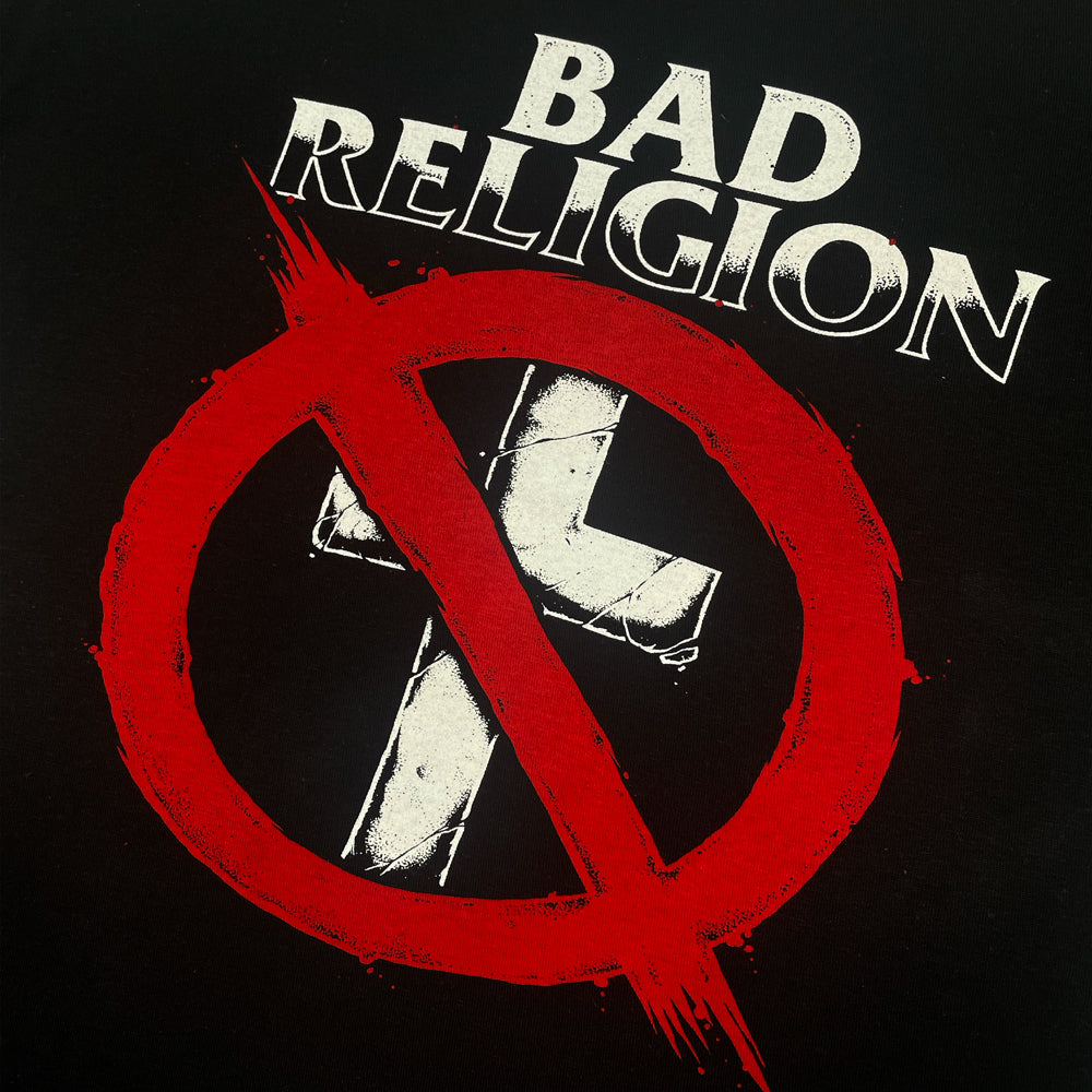 Close up of a black Bad Religion tee with "Bad Religion" written in bold lettering and graffiti style crossbuster logo