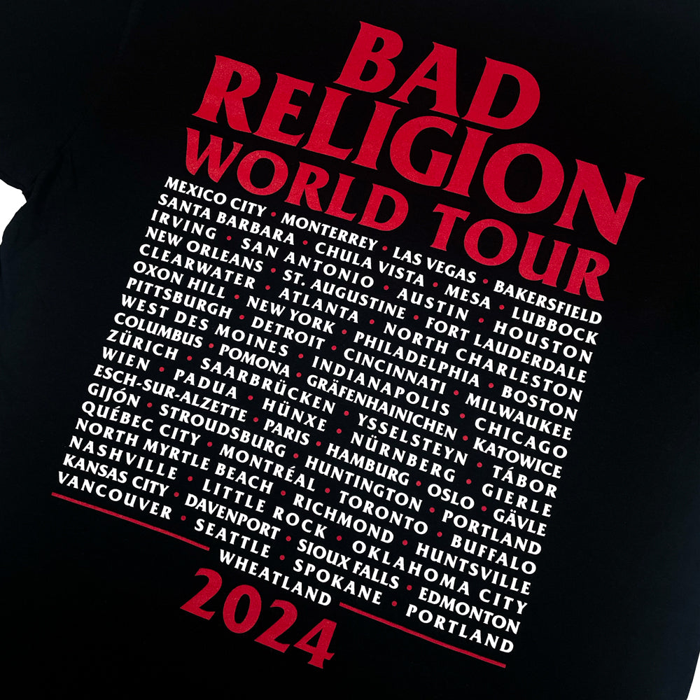 Close up of a black Bad Religion t-shirt front print with red text reading "Bad Religion" World Tour 2024" and a list of cities from the 2024 tour