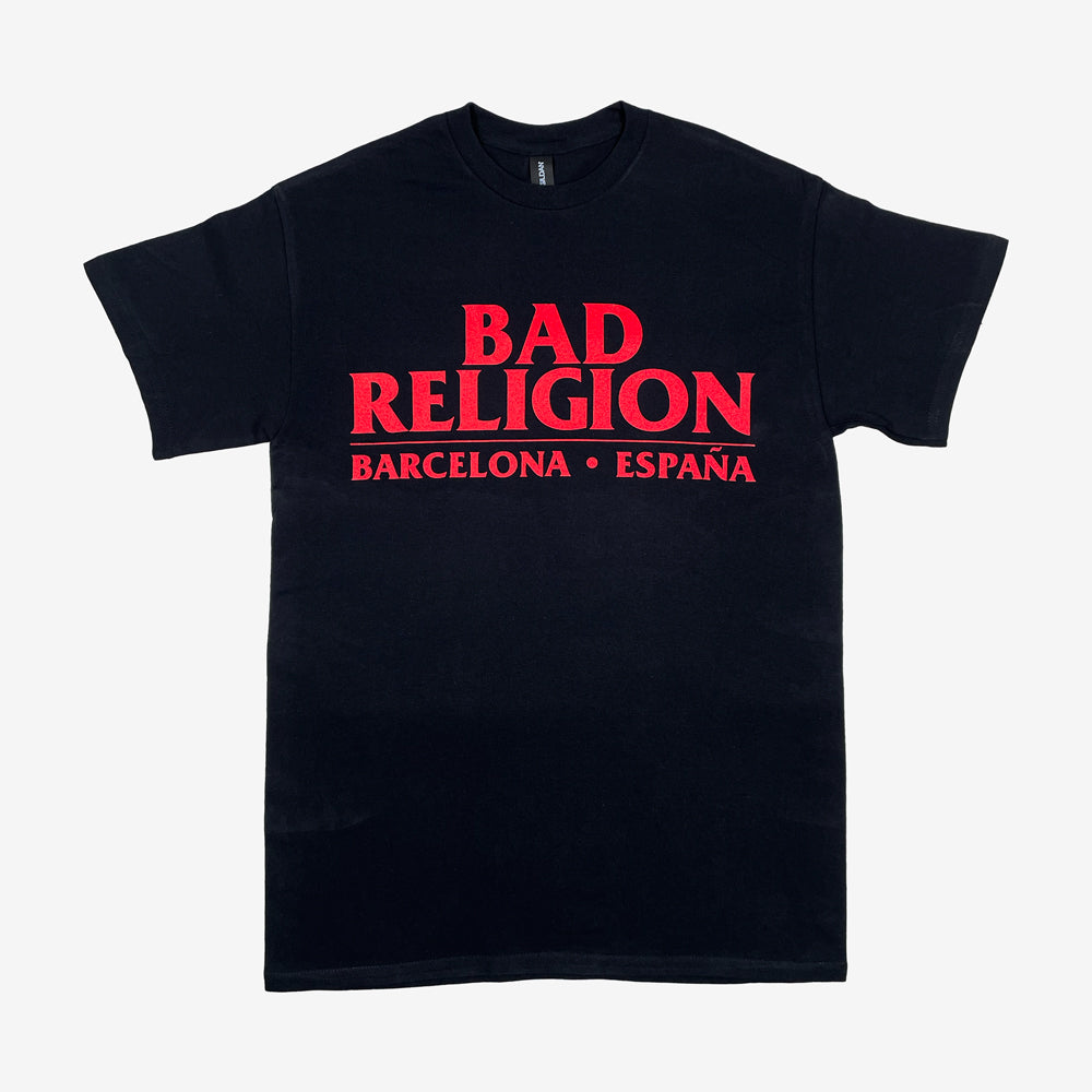 Front of a black tee against a white background with red text reading "Bad Religion, Barcelona, España"