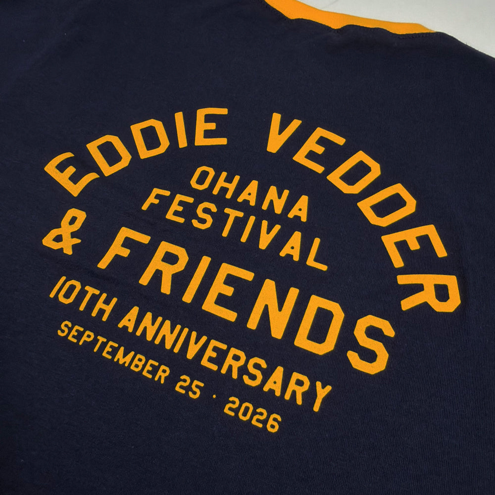 Close-up of yellow Ohana Festival 10th Anniversary graphic on navy Eddie Vedder Moto Club Tee