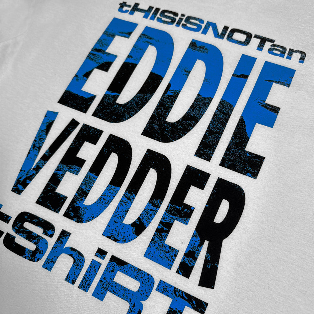 Close-up of distressed blue and black Eddie Vedder graphic on white NOTA Tee