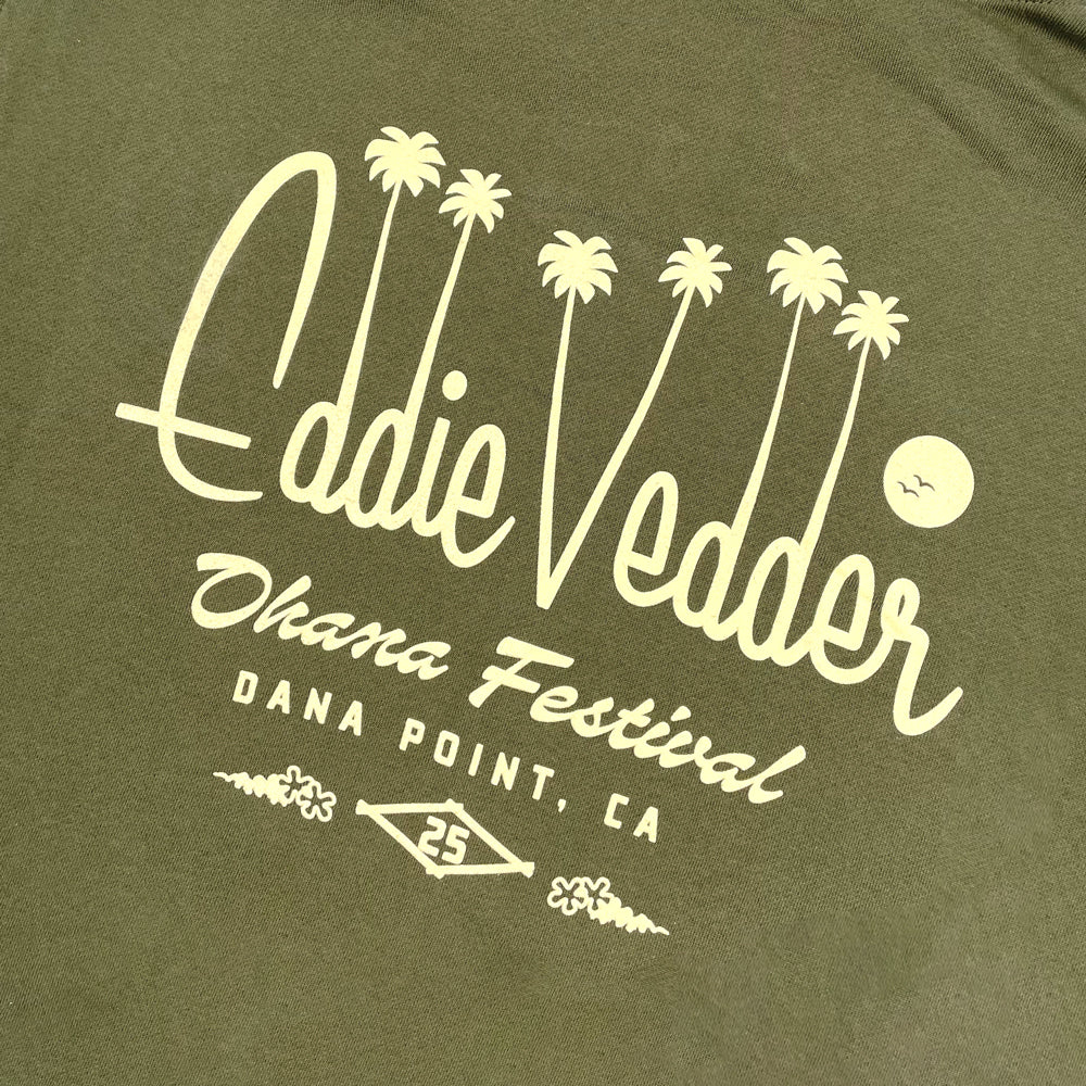 Close up of a green hoodie with typography reading "Eddie Vedder Ohana Festival Dana Point, CA 25"