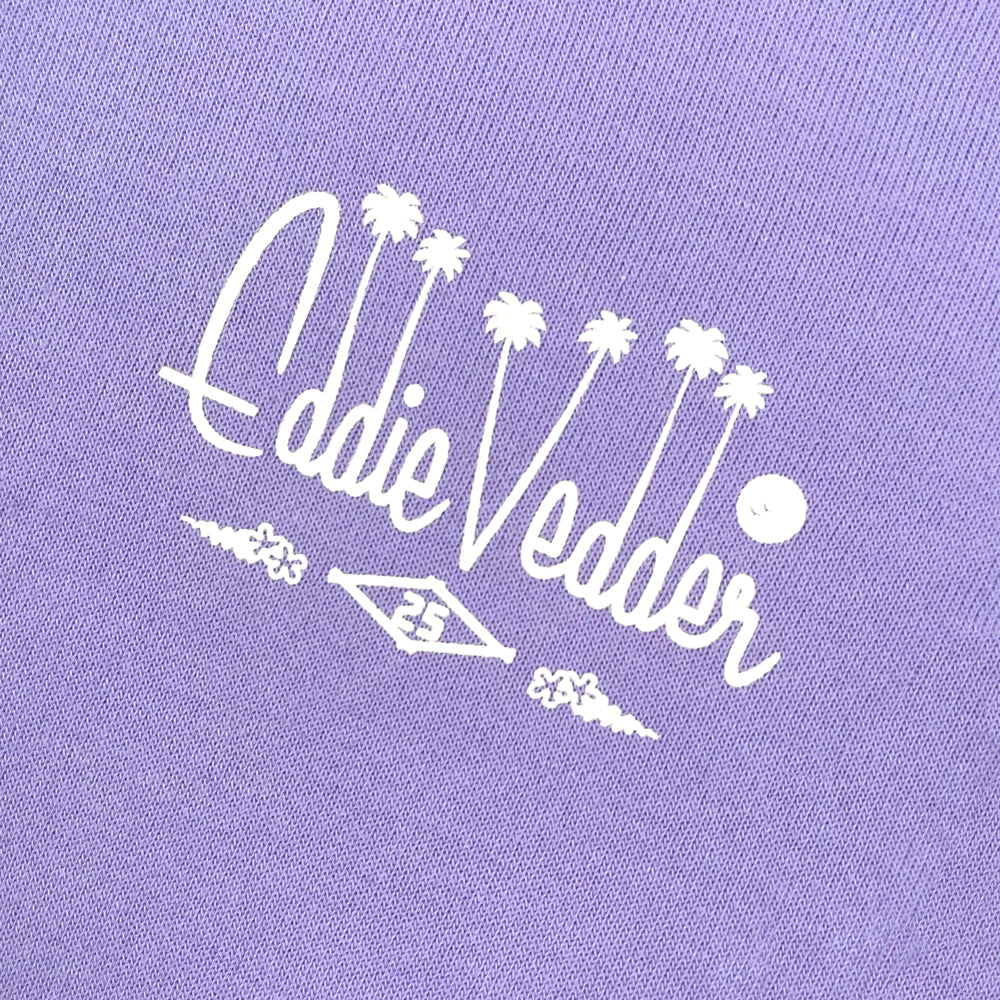 Close up of a purple hoodie from the front with typography on left chest reading "Eddie Vedder 25"