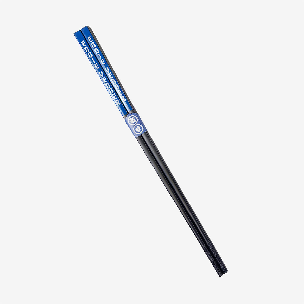 A pair of chopsticks against a white background. The chopsticks are black with blue ends with white text reading "Eddie Vedder."