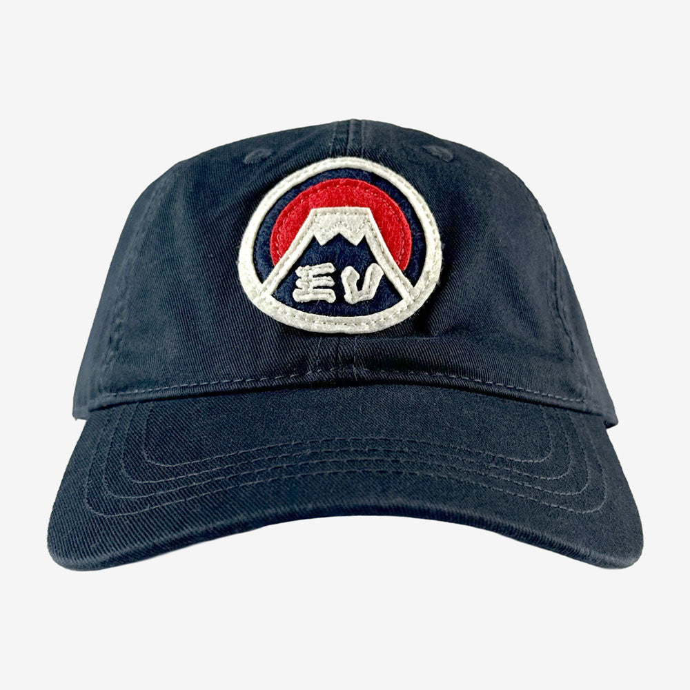 Navy blue cap with a logo featuring mountains and 'EV' initials on a white background Eddie Vedder Dad Hat