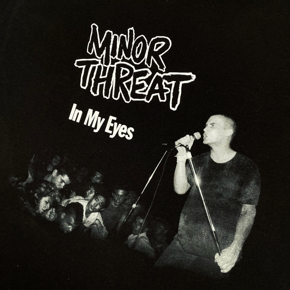 Close up of a black Minor Threat tee featuring the album cover from the In My Eyes EP