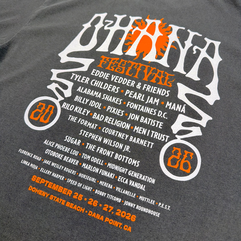 Close-up of the 2026 Ohana Festival lineup, September 25–27 dates, and Dana Point details on the tee’s back.