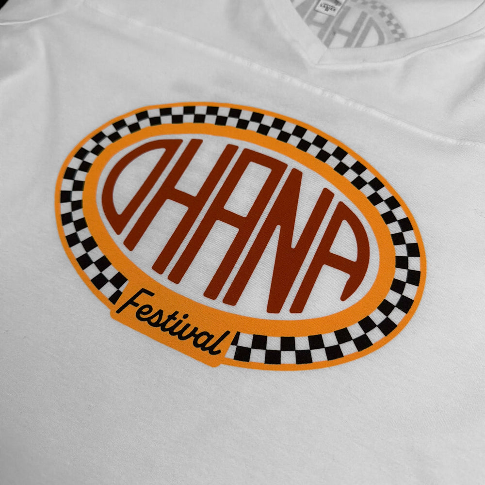 Close-up of the Ohana Festival oval graphic with an orange outline and black-and-white checkered border.
