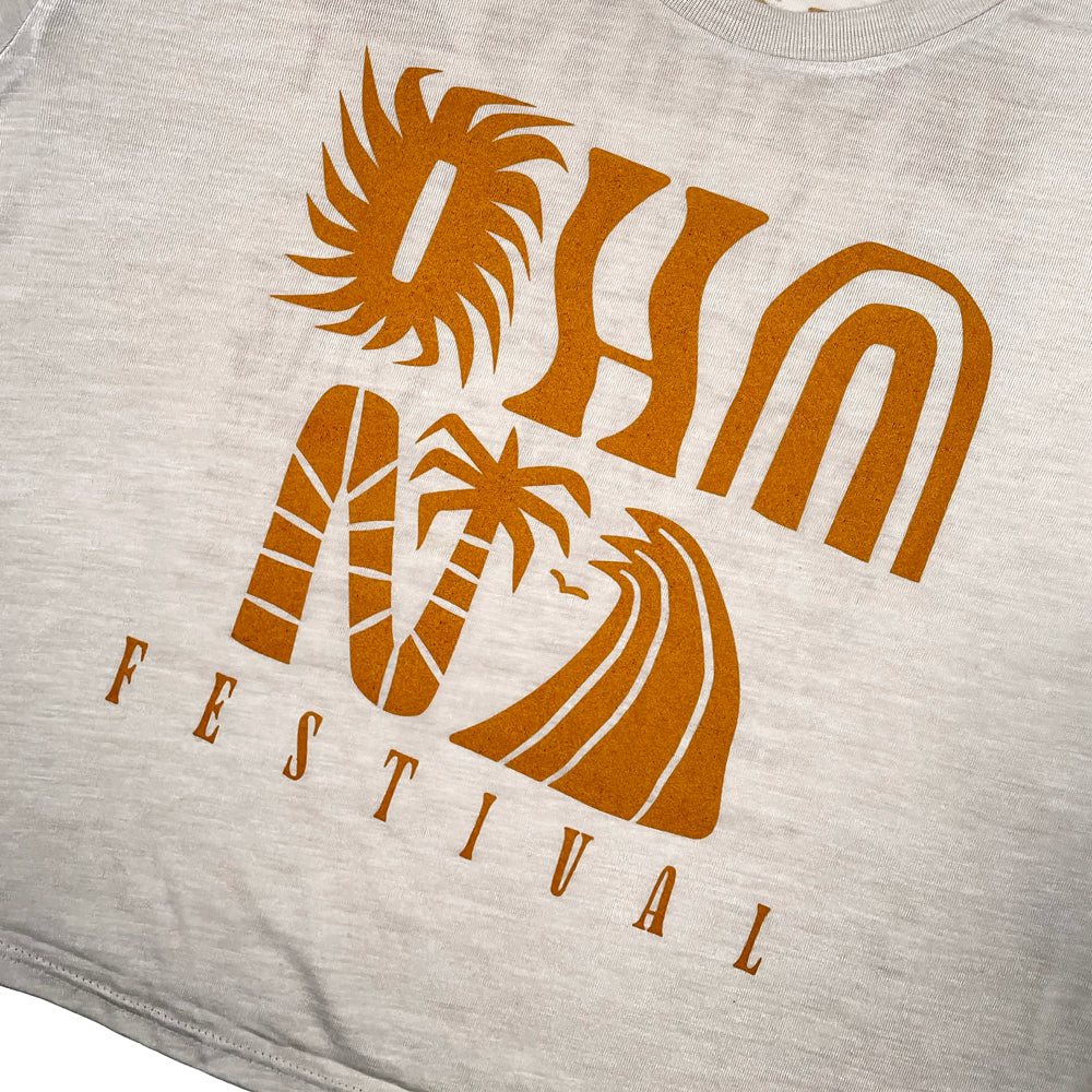Close up of a beige Ohana Festival t-shirt front print with typography reading "Ohana"