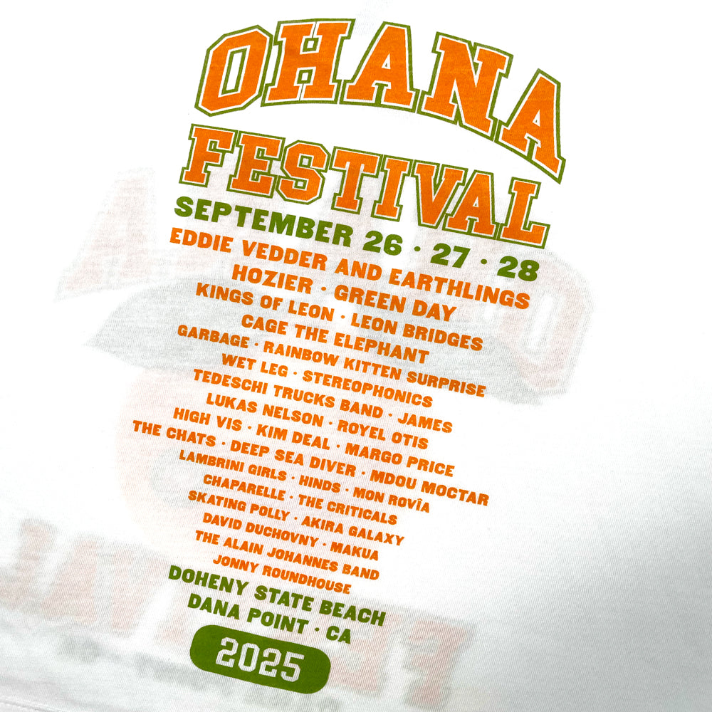 Close up of the back of a white Ohana Festival t-shirt from the back featuring list of bands from the 2025 festival and text reading "Ohana Festival September 26, 27, 28; Doheny State Beach, Dana Point, CA 2025" 