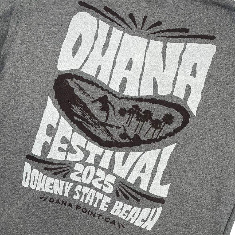 Close up of a grey hoodie from the back with graphic of man surfing at the beach surrounded by the text "Ohana Festival 2025 Doheny State Beach Dana Point, CA"