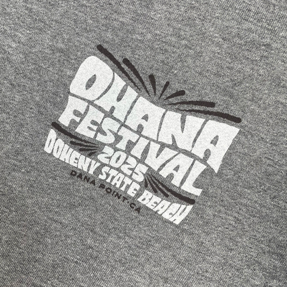 Close up of a grey hoodie from the front with text graphic reading "Ohana Festival 2025 Doheny State Beach Dana Point, CA"