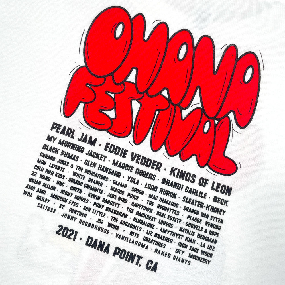 Close up of the back of a white t shirt with red text reading "Ohana Festival" and black text listing all the bands that played for the 2021 Ohana Festival. Below the band list is black text reading "2021 Dana Point CA"