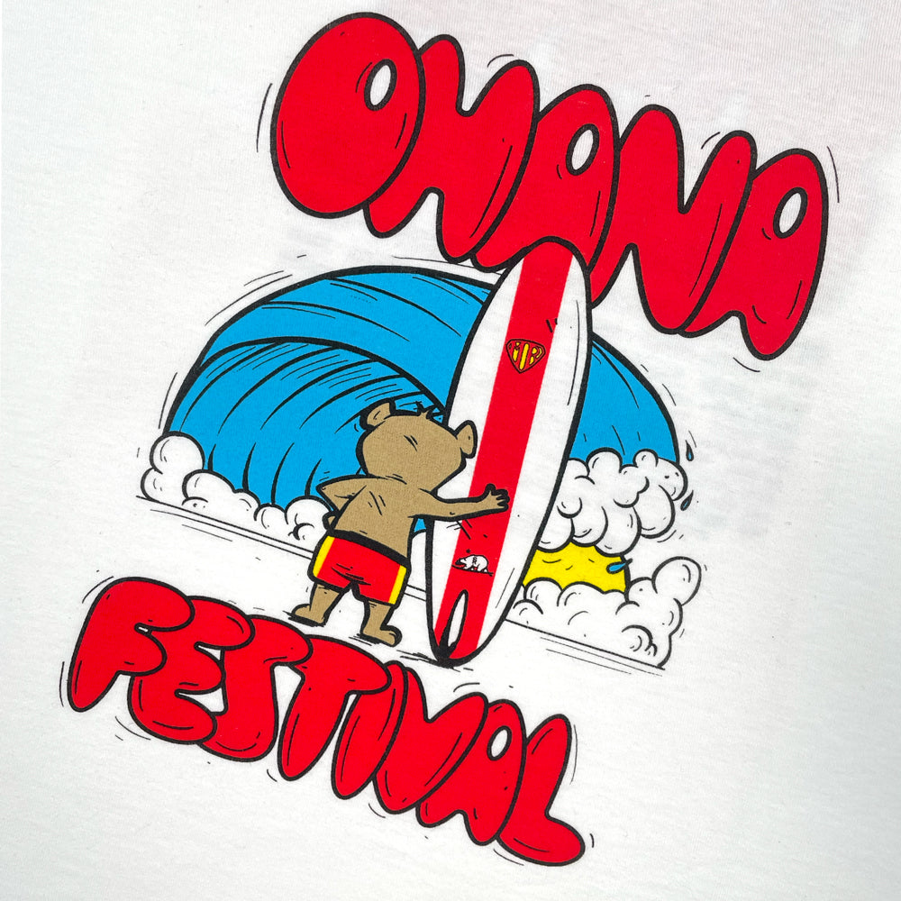 Close up of a white t shirt with red text reading "Ohana Festival" and a graphic of a cartoon bear looking at a wave while holding a surf board.