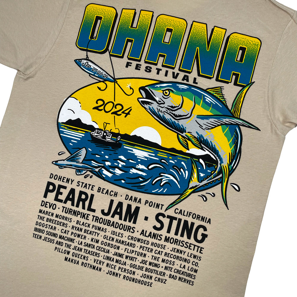 Close up of a beige Ohana Festival t-shirt back print featuring a fishing graphic and the text "Ohana Festival 2024" and the list of bands from the event