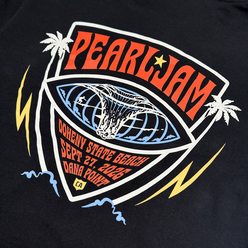 Close-up of Pearl Jam Big Kahuna surf graphic with palm trees and Dana Point event details on black hoodie
