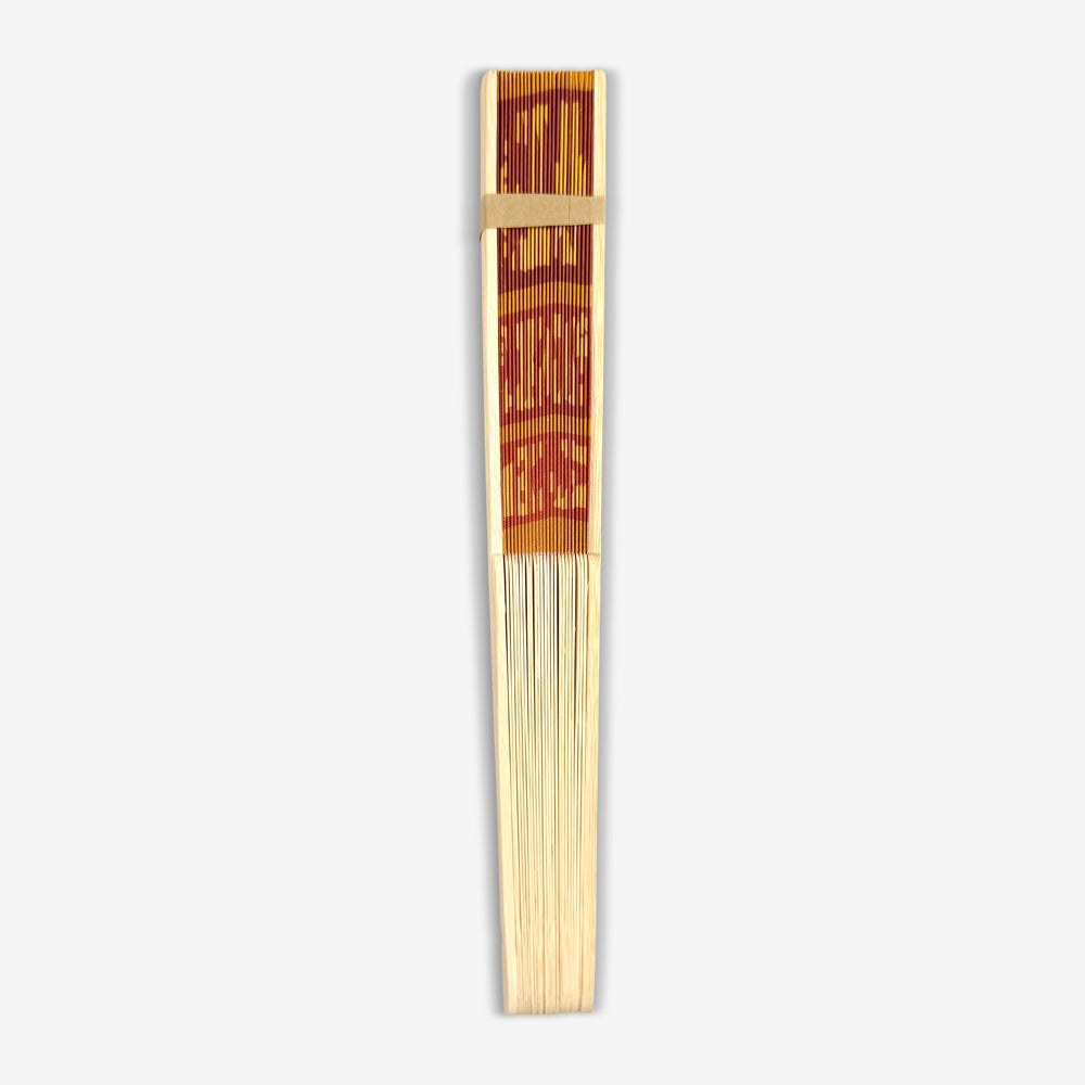 Closed Pearl Jam Mexicali Hand Fan with orange printed detail and natural wood ribs