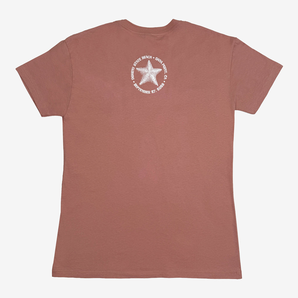 Pearl Jam Shells Tee in desert pink with small white starfish and Dana Point graphic on upper back