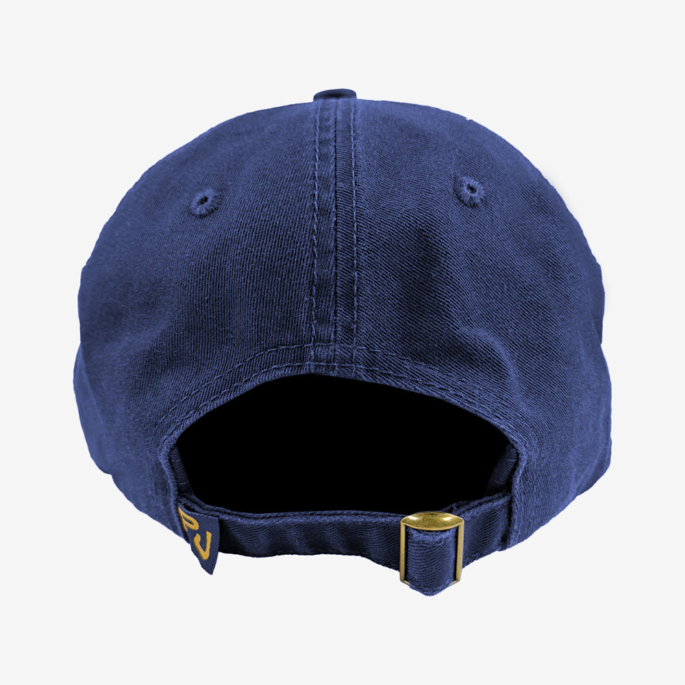 Back view of Pearl Jam South Swell Dad Hat showing adjustable fabric strap, metal buckle, and Pearl Jam flag label.