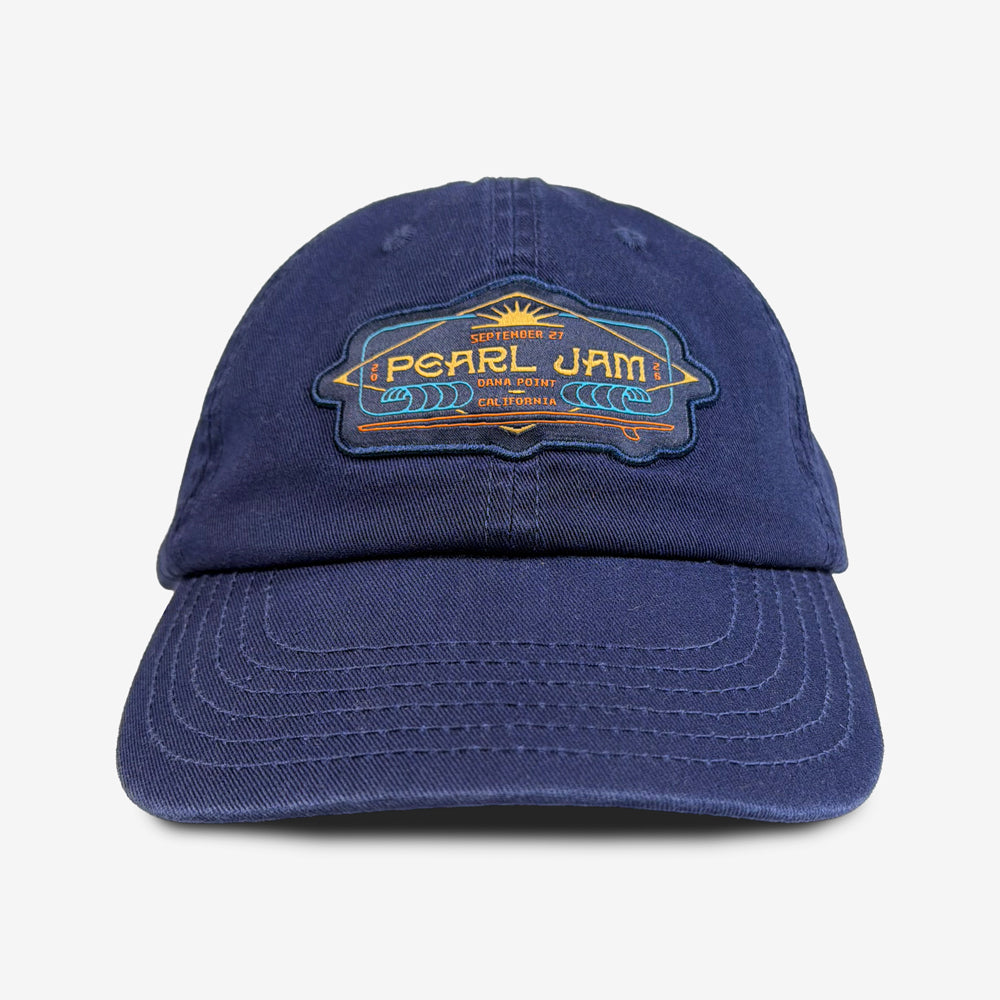 Front view of navy Pearl Jam South Swell Dad Hat with embroidered September 27, 2026 Dana Point California artwork.