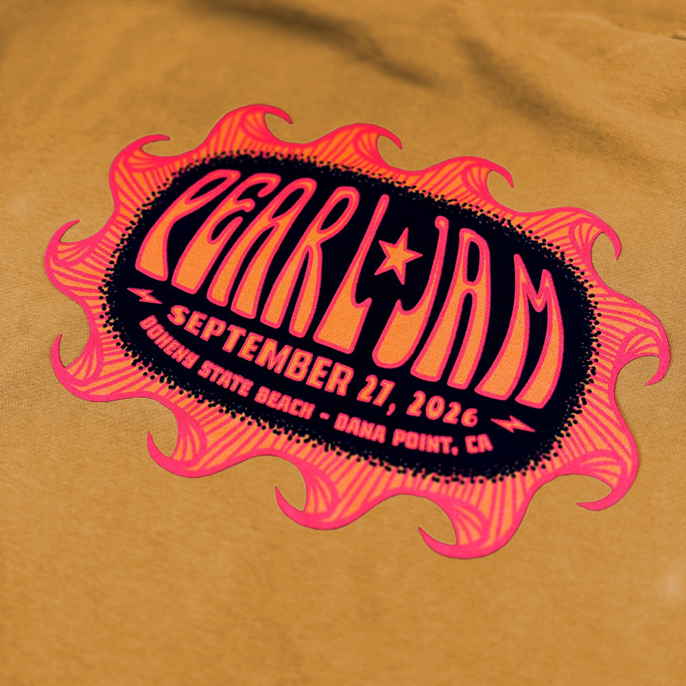 Close-up of pink and navy Pearl Jam Doheny State Beach event artwork on peanut butter hoodie