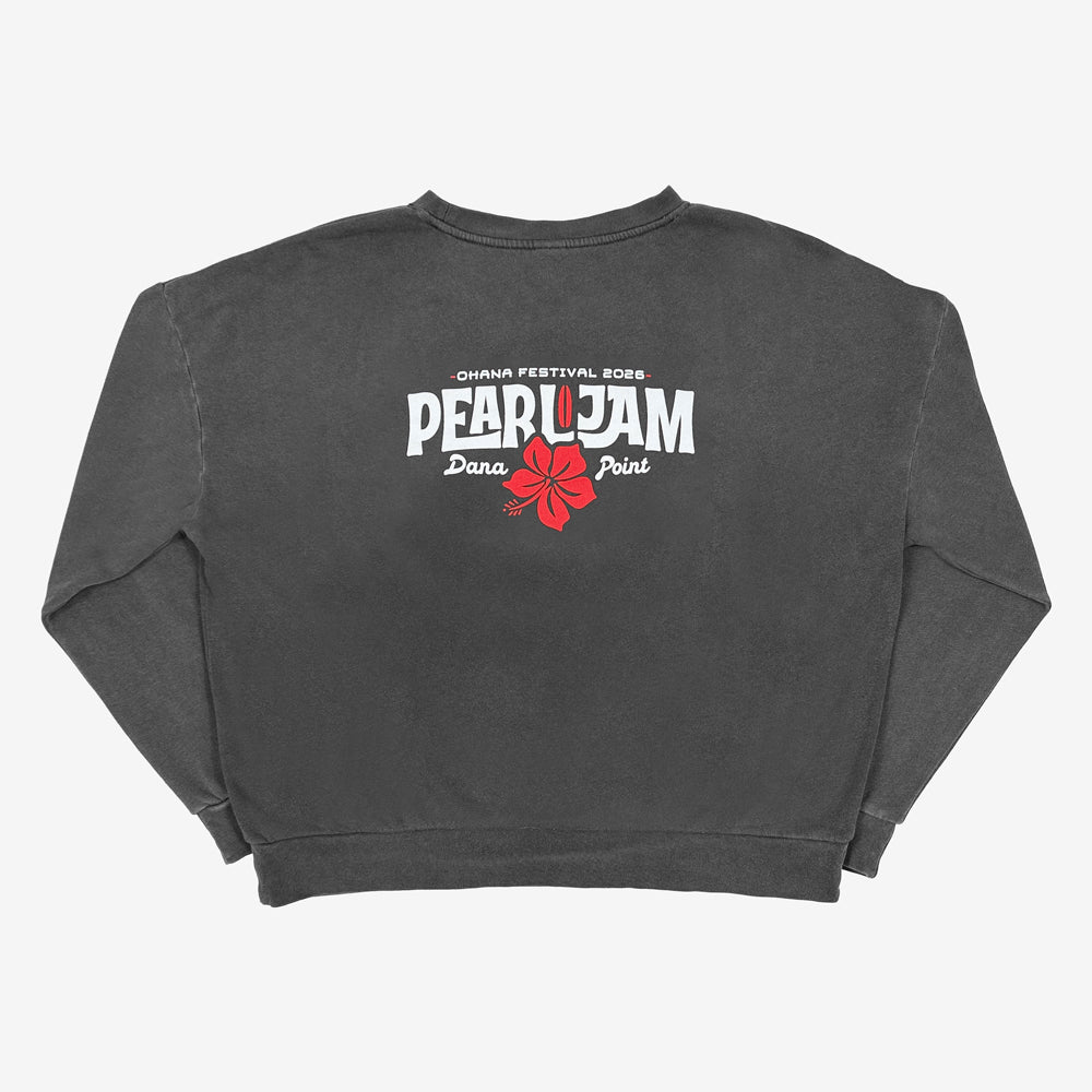 A dark gray washed crewneck sweatshirt shown from the back, featuring a graphic print with the text 'Ohana Festival 2026, PEARL JAM, Dana Point' and a red hibiscus flower on a white background.