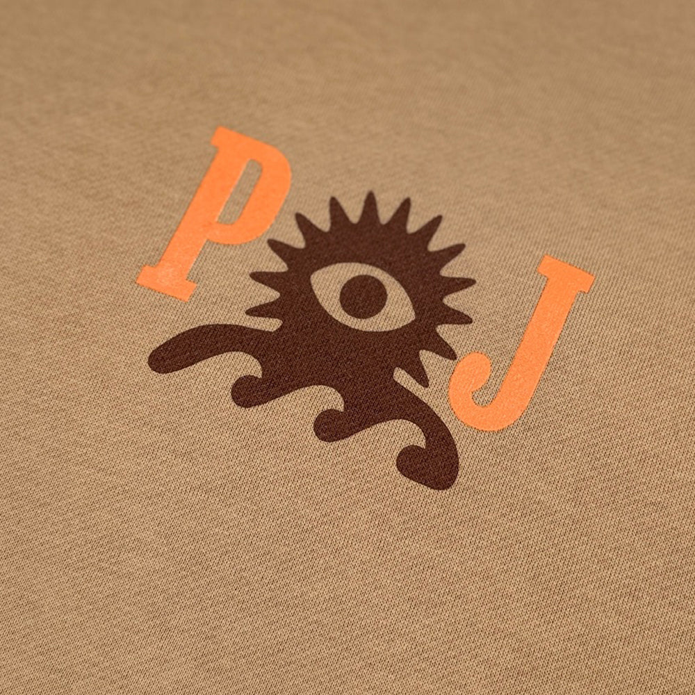 Close-up of orange PJ lettering and brown Wave Lord character on sandstone crewneck