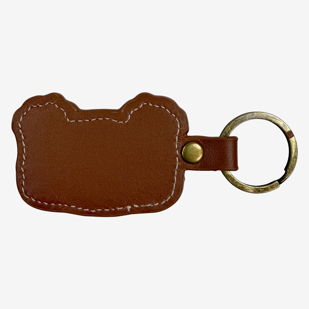 Back of Pearl Jam Wild Palms Keychain featuring brown leather finish, contrast stitching, and metal key ring.