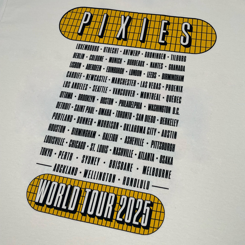 Close up of the back of a natural shirt with text inside a yellow grid reading "Pixies" at the top of the shirt and "World Tour 2025" at the bottom. In between are all the 2025 Pixies Tour dates.