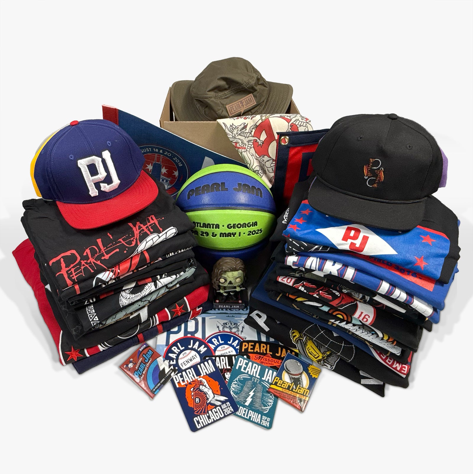 Collection of Pearl Jam merchandise including hats, t-shirts, and stickers on a white background