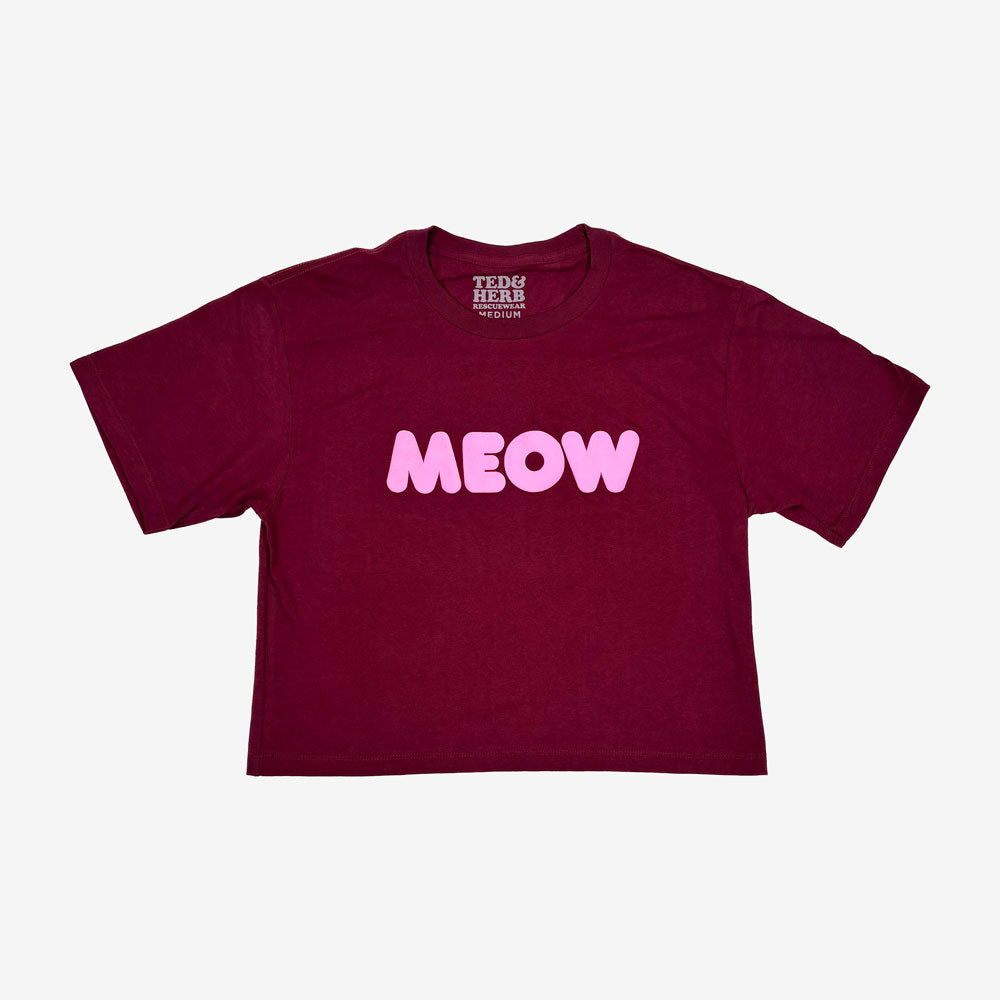 Burgundy crop t-shirt with 'MEOW' printed; official Ted & Herb merch by TSURT